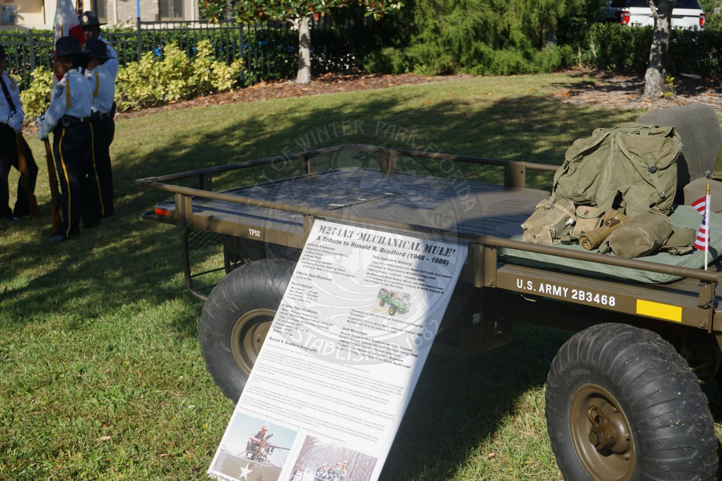 an army vehicle with an open bed