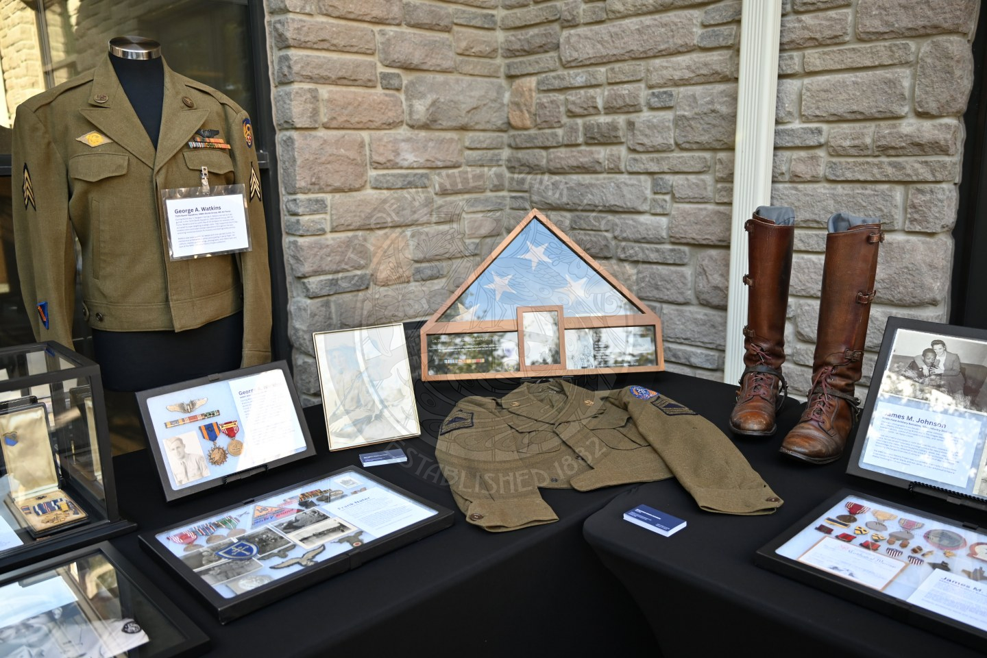 World War memroabilia on display on a table.