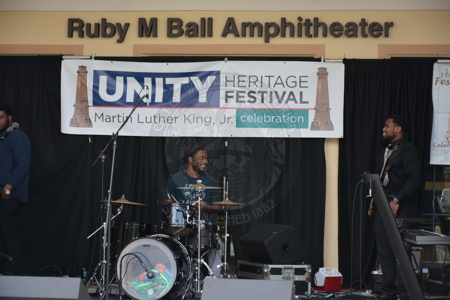 Band on the amphitheater playing under the Unity Heritage Festival Banner