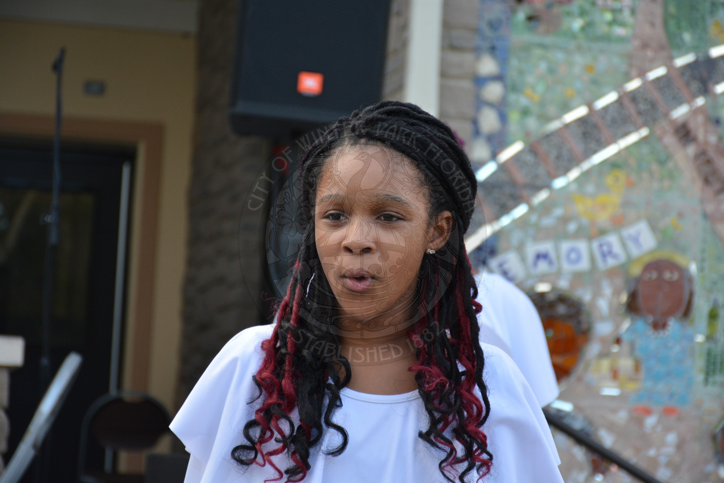 close up of young girl singing