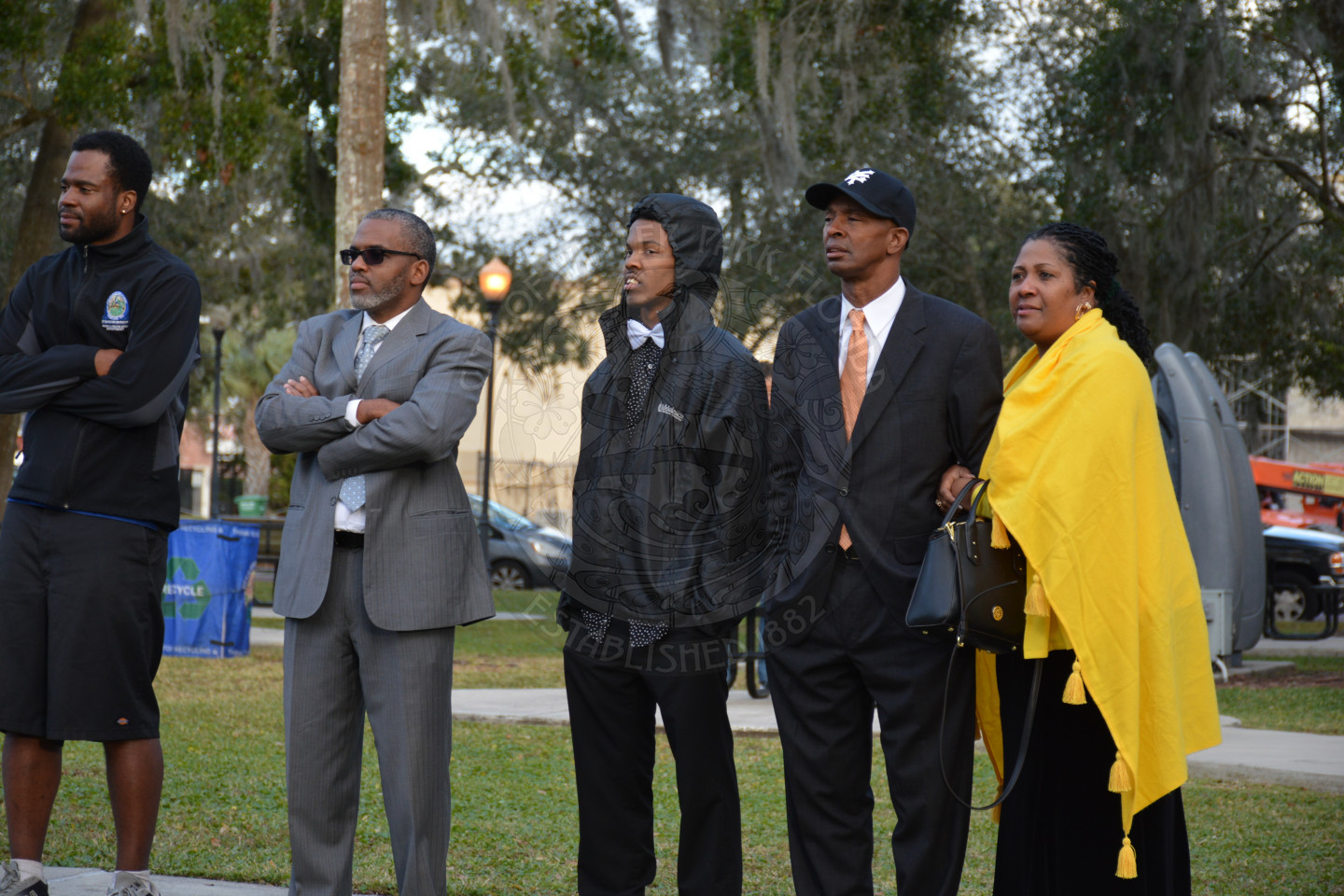 photo of event attendees watching the performance while standing