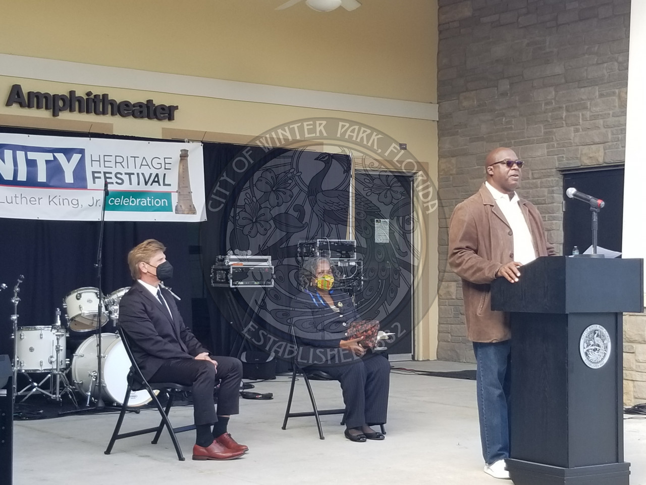 Man speaking at podium at the Unity Hertiage Festival