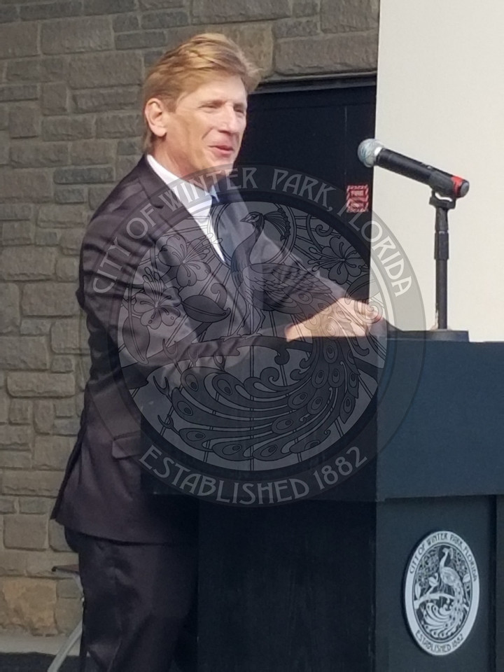 Man speaking at podium at the Unity Heritage Festival