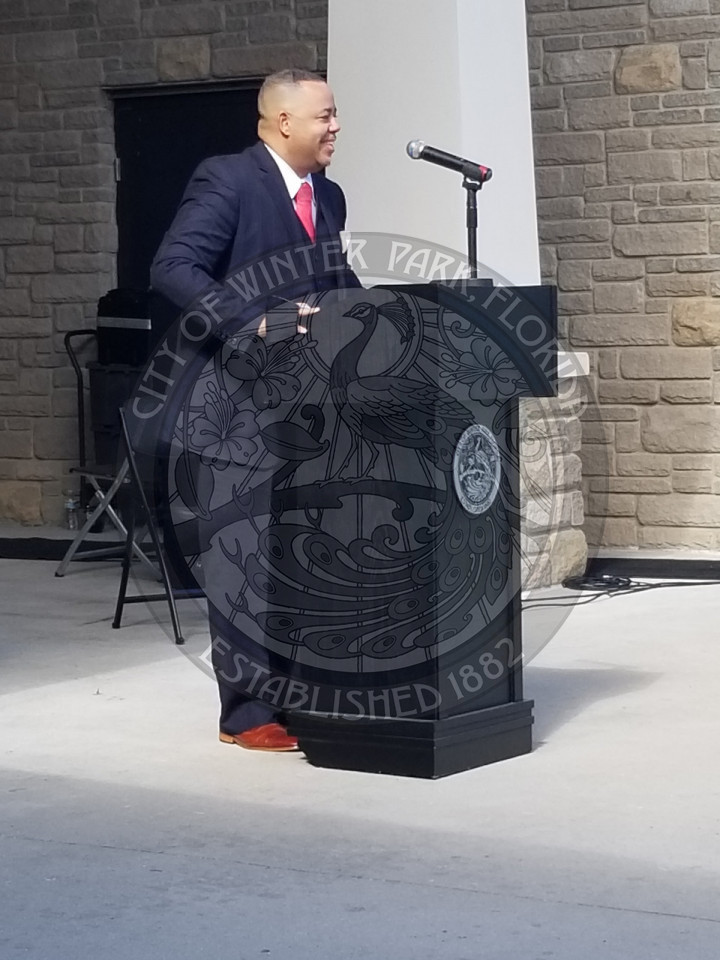 Man speaking at podium at the Unity Hertiage Festival