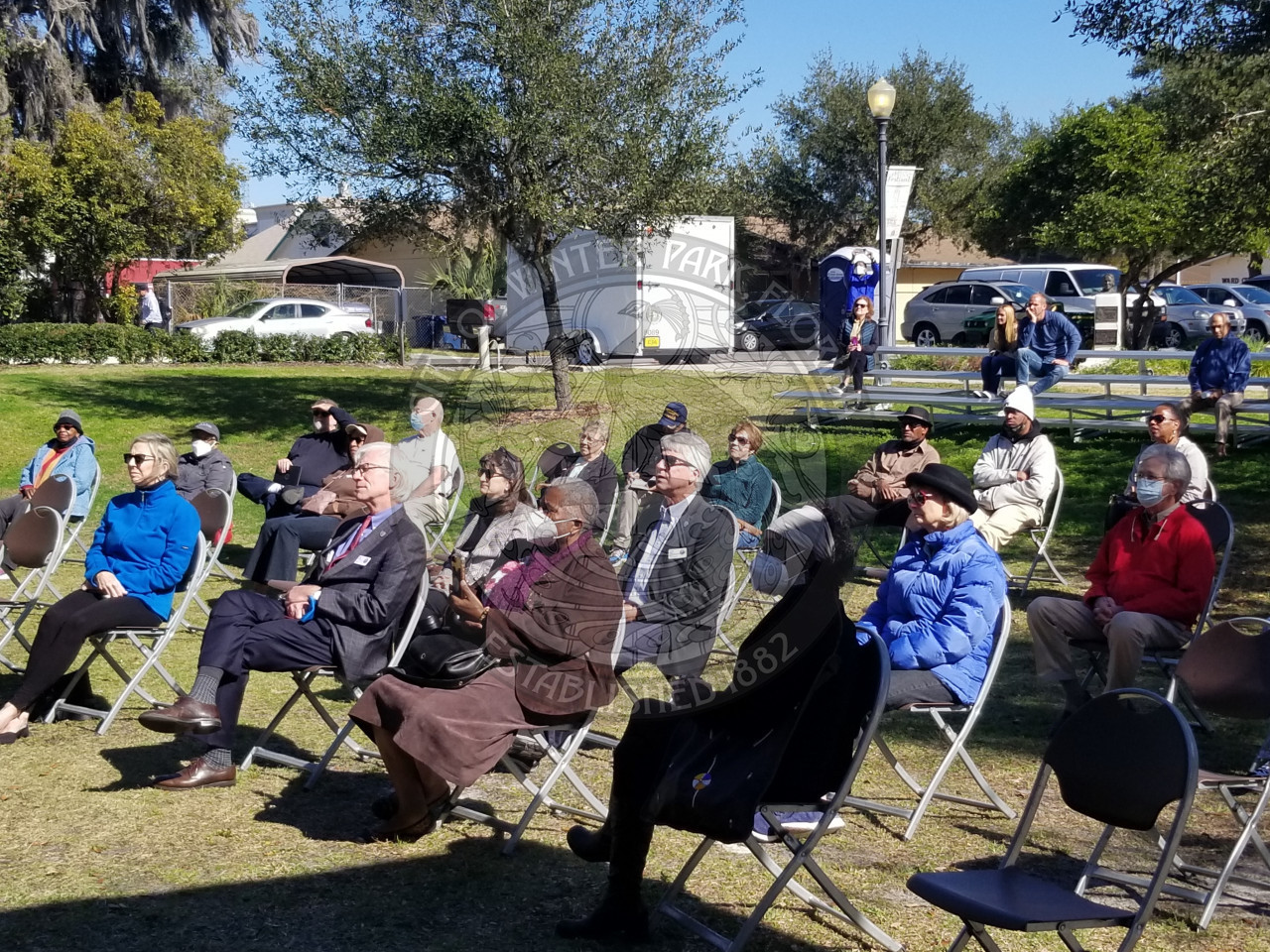 Audience sitting in chairs listening to the Unity Heritage Festival speakers