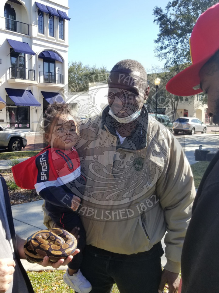 Winter Park Employee and little girl smiling