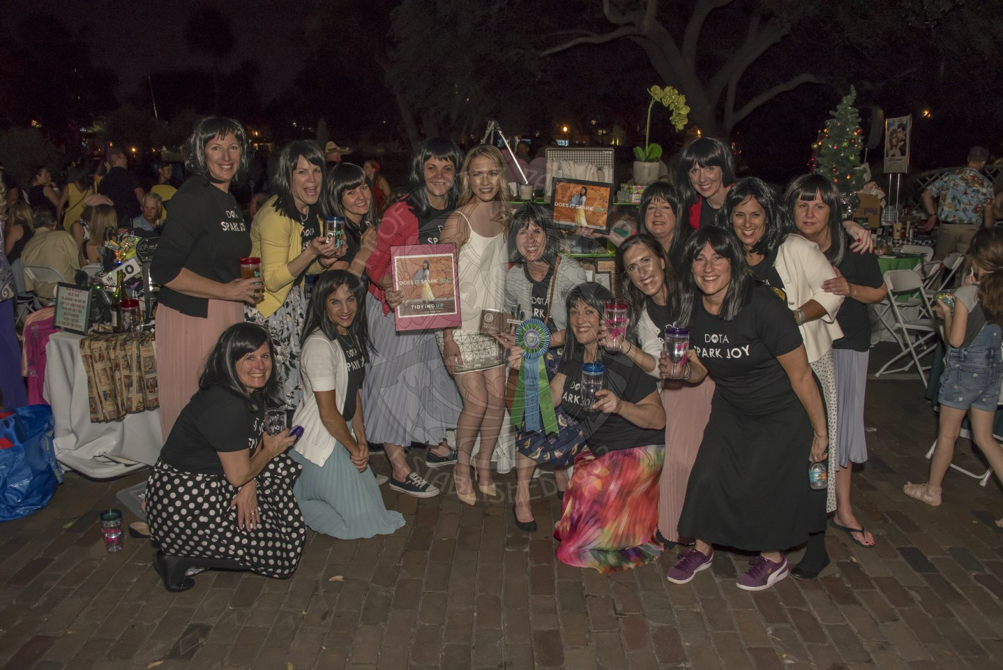 Group of people dressed in Marie Kondo themed clothing.
