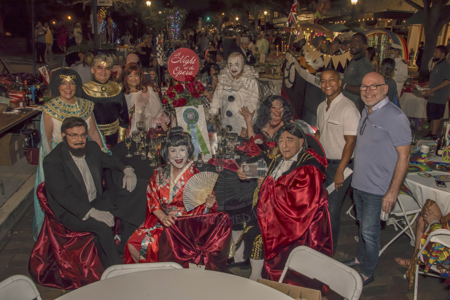 Group of people dressed in Night at the Opera themed clothing.