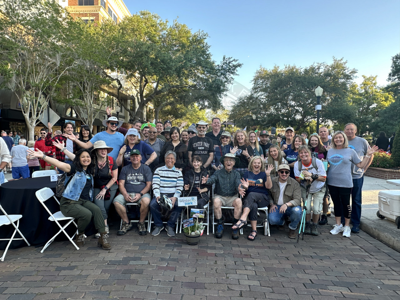 City employees all sitting and standing for a group picture dressed in the theme of "the other Winter Park"