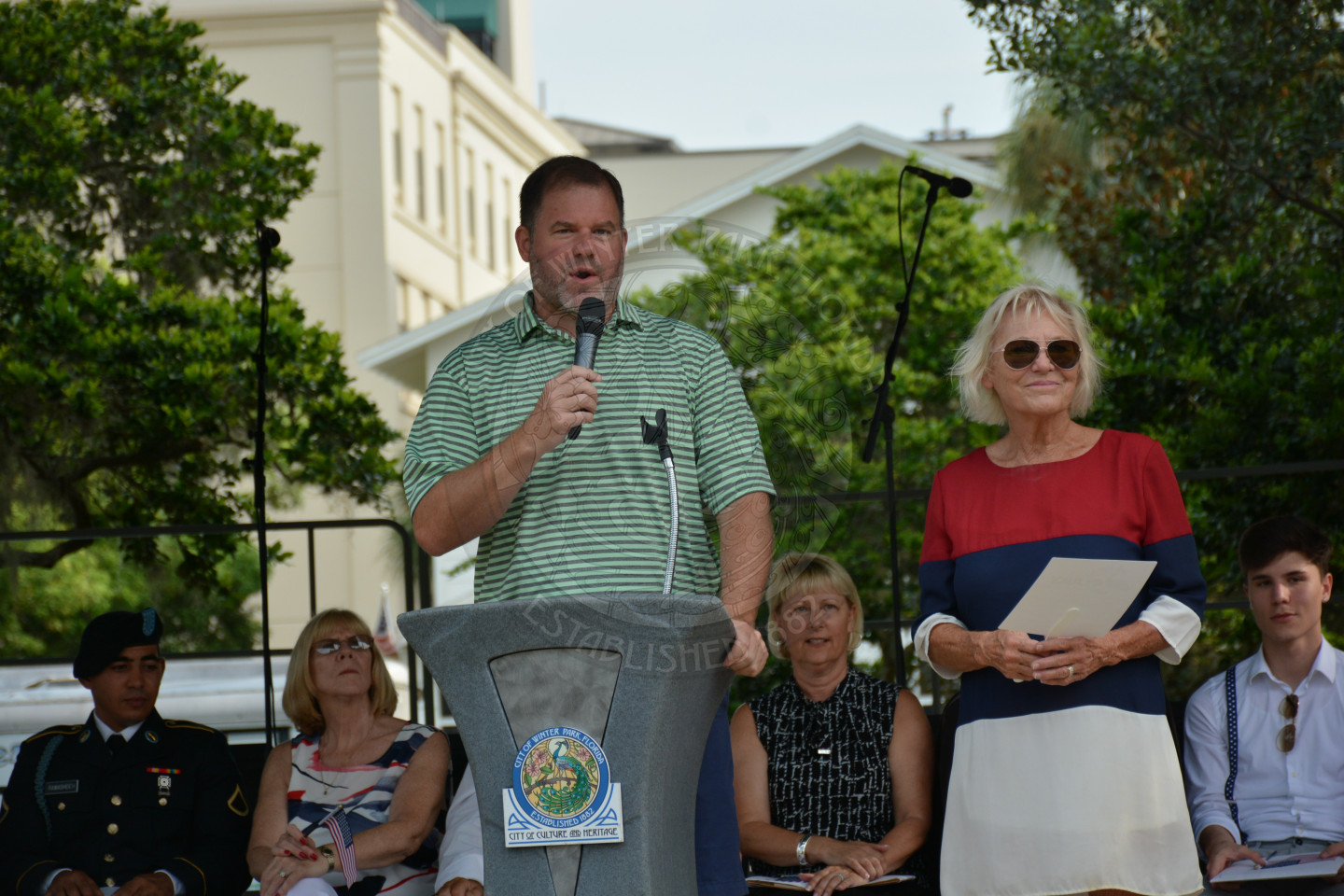 Mayor Steve Leary and Commissioner on stage making announcements