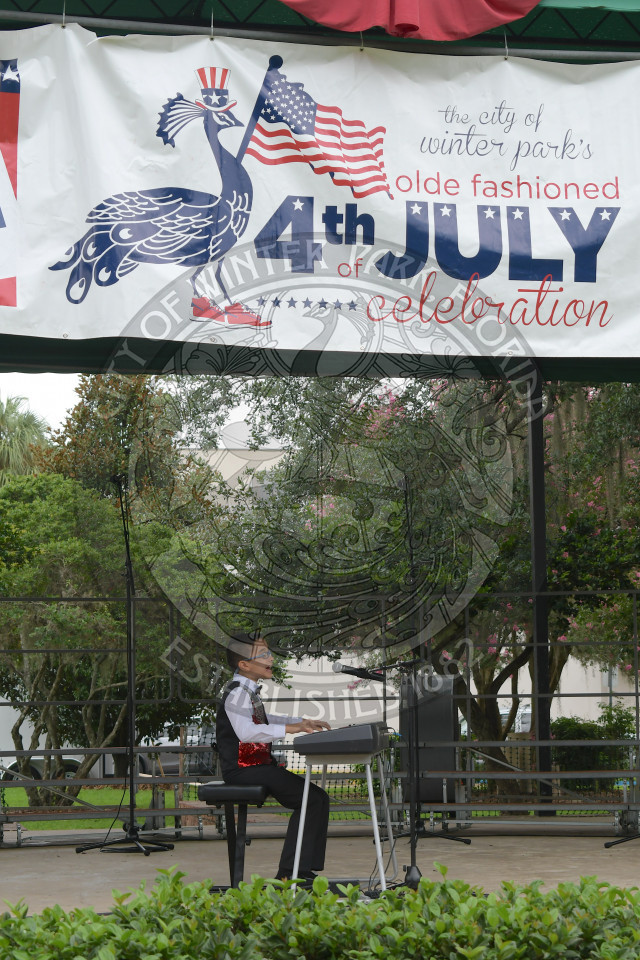 Elvis Avetis, OSPC top talent finalist, playing piano on stage