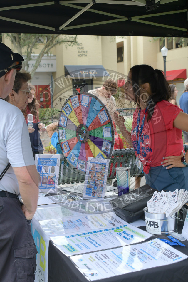 Vanessa Balta, the city's sustainability manager, talking about recycling to event attendees