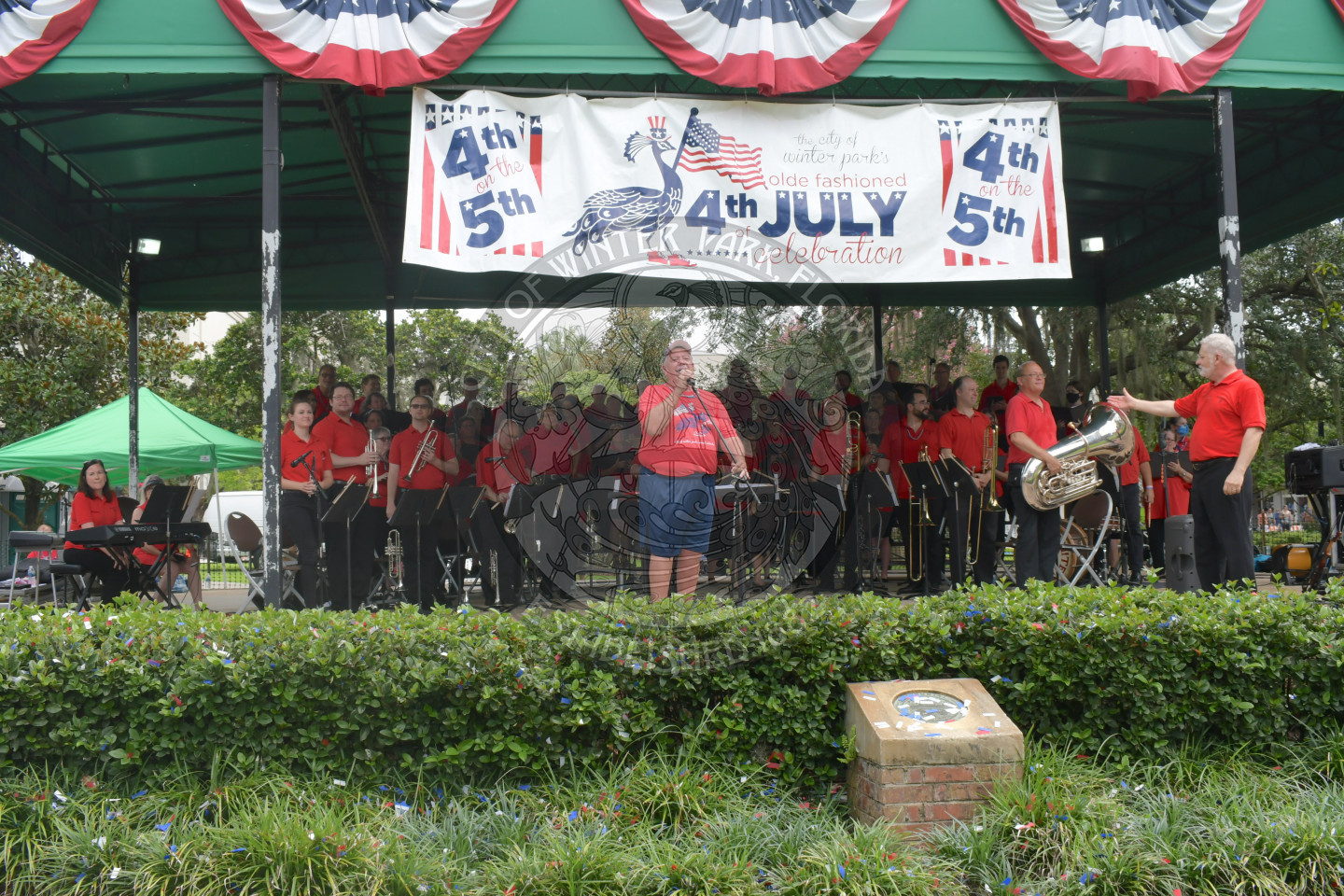 Johnny Miller, the city's event manager, on stage with the Bach