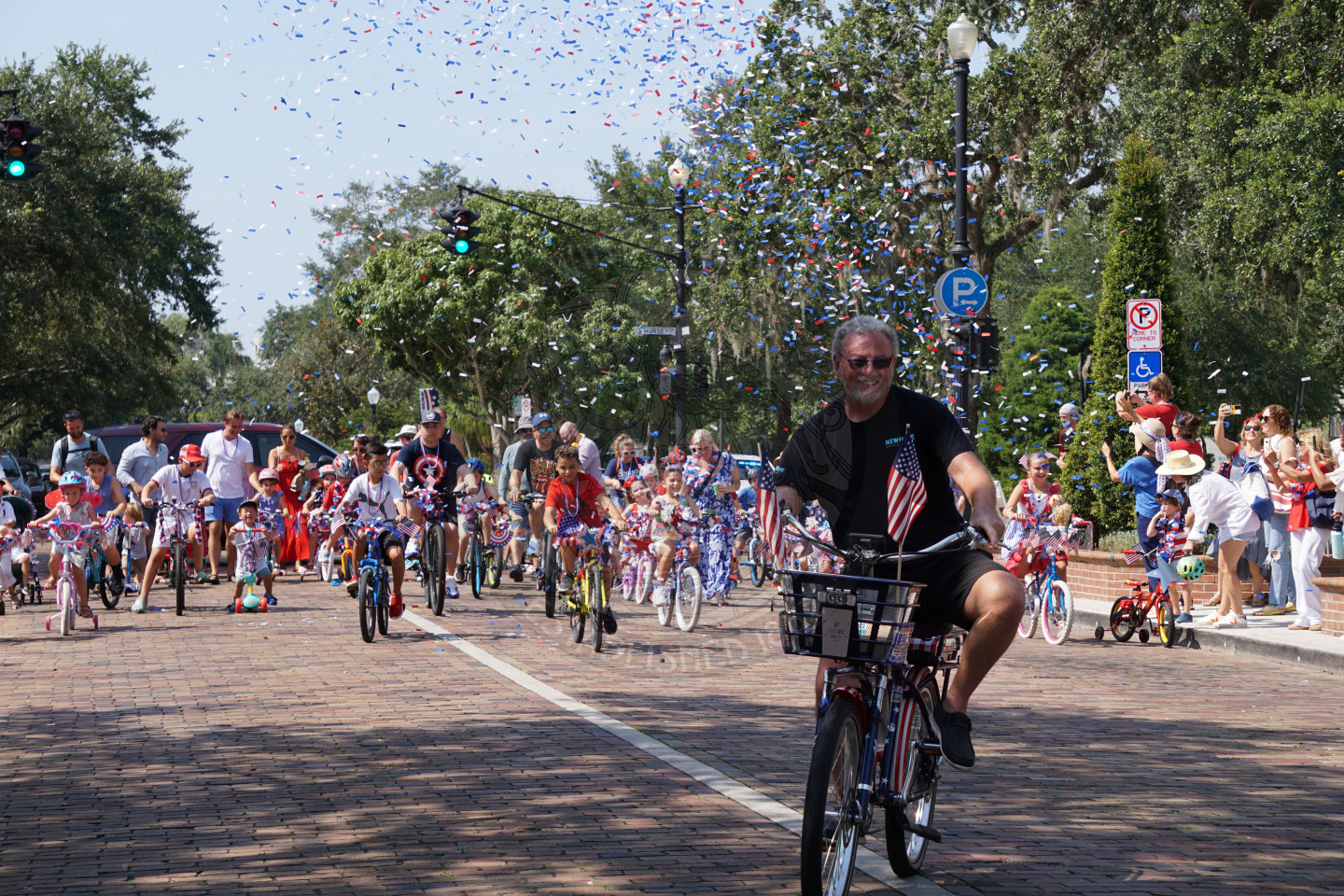 Kids riding bikes on park avenue for the bike parade