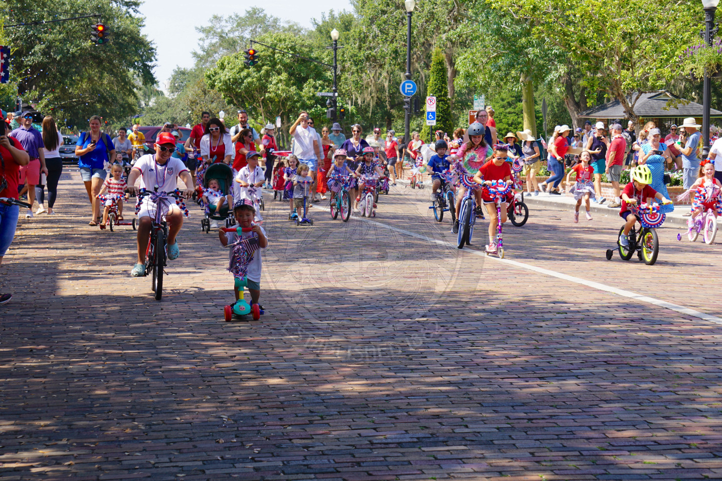 Kids riding bikes on park avenue for the bike parade