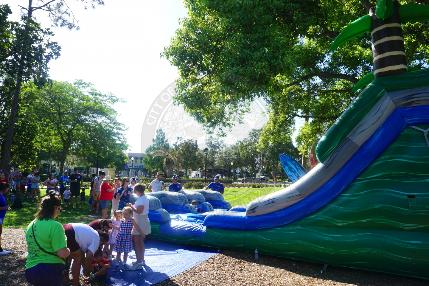 Bounce slide with a line for kids to climb.