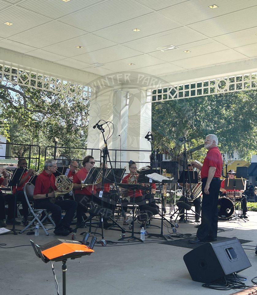 Bach festival band performing at Fourth of July event.