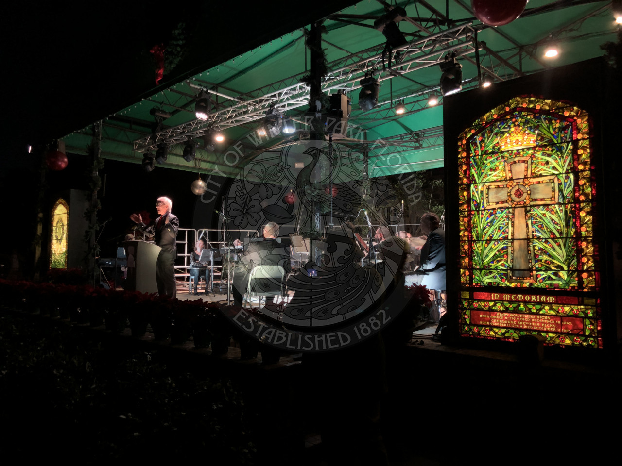 Central Park stage with a stained glass window to the right