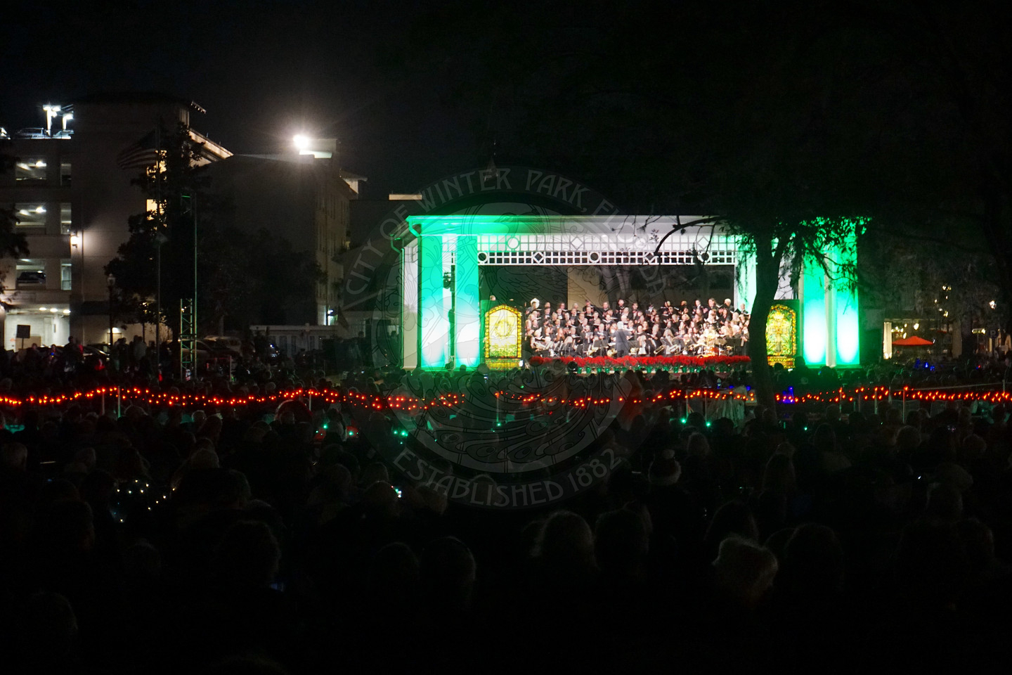 Bach Festival Society on stage perofrming at Christmas in the Park