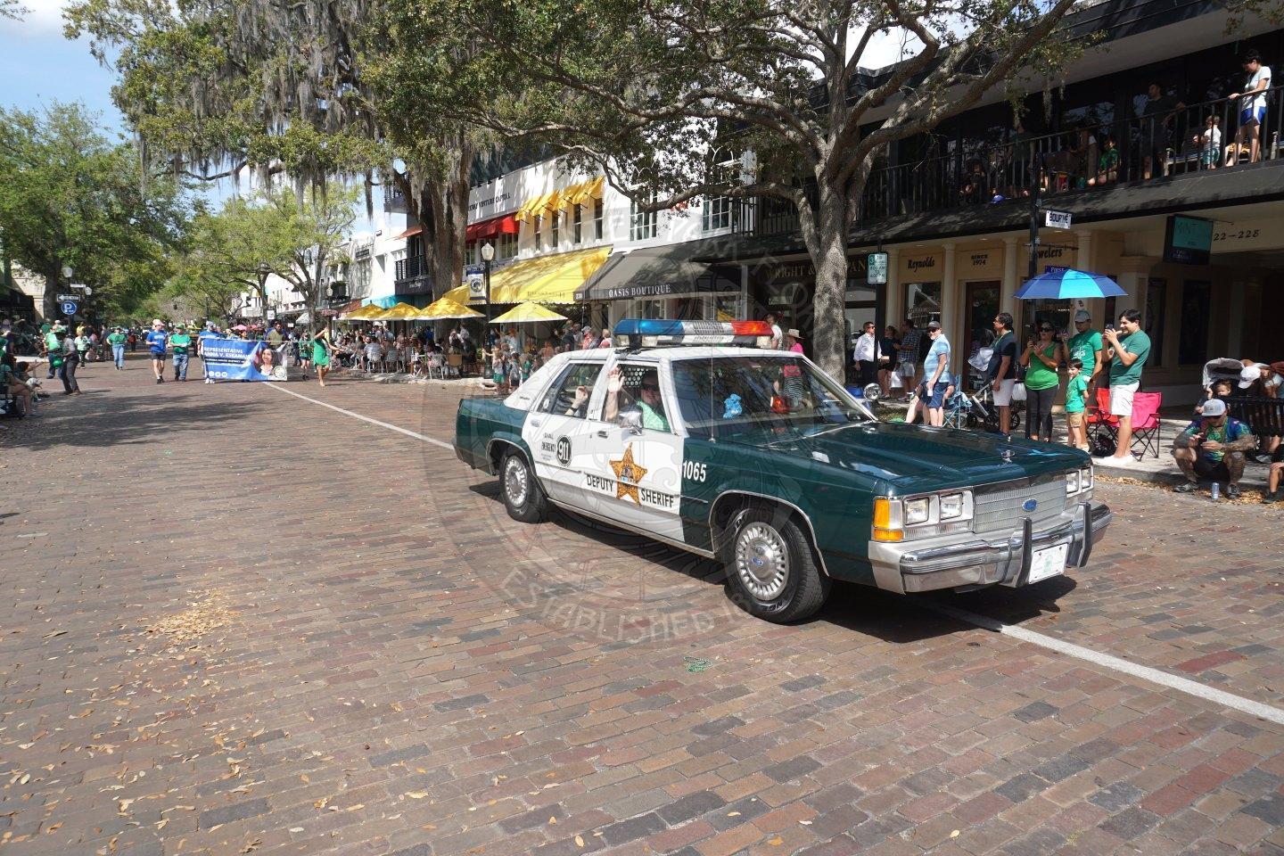 Vintage police car driving in the parade