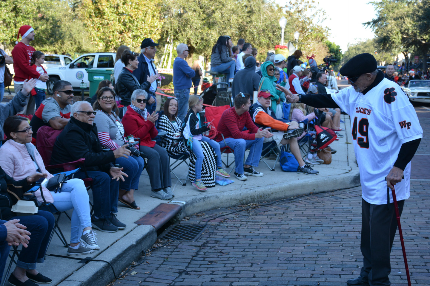 Mayor waving to the crowd during the parade