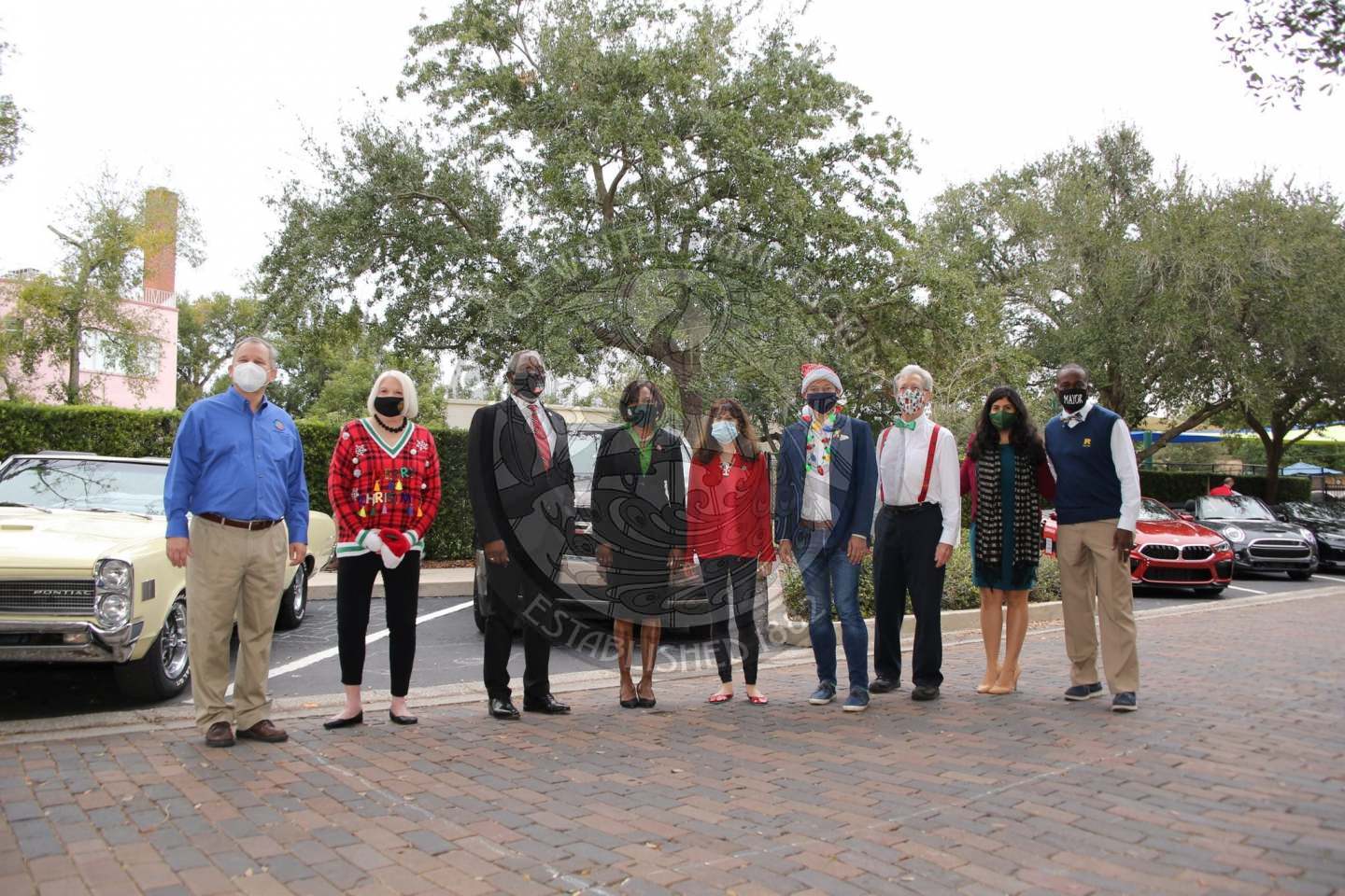 elected officials standing together at the parade