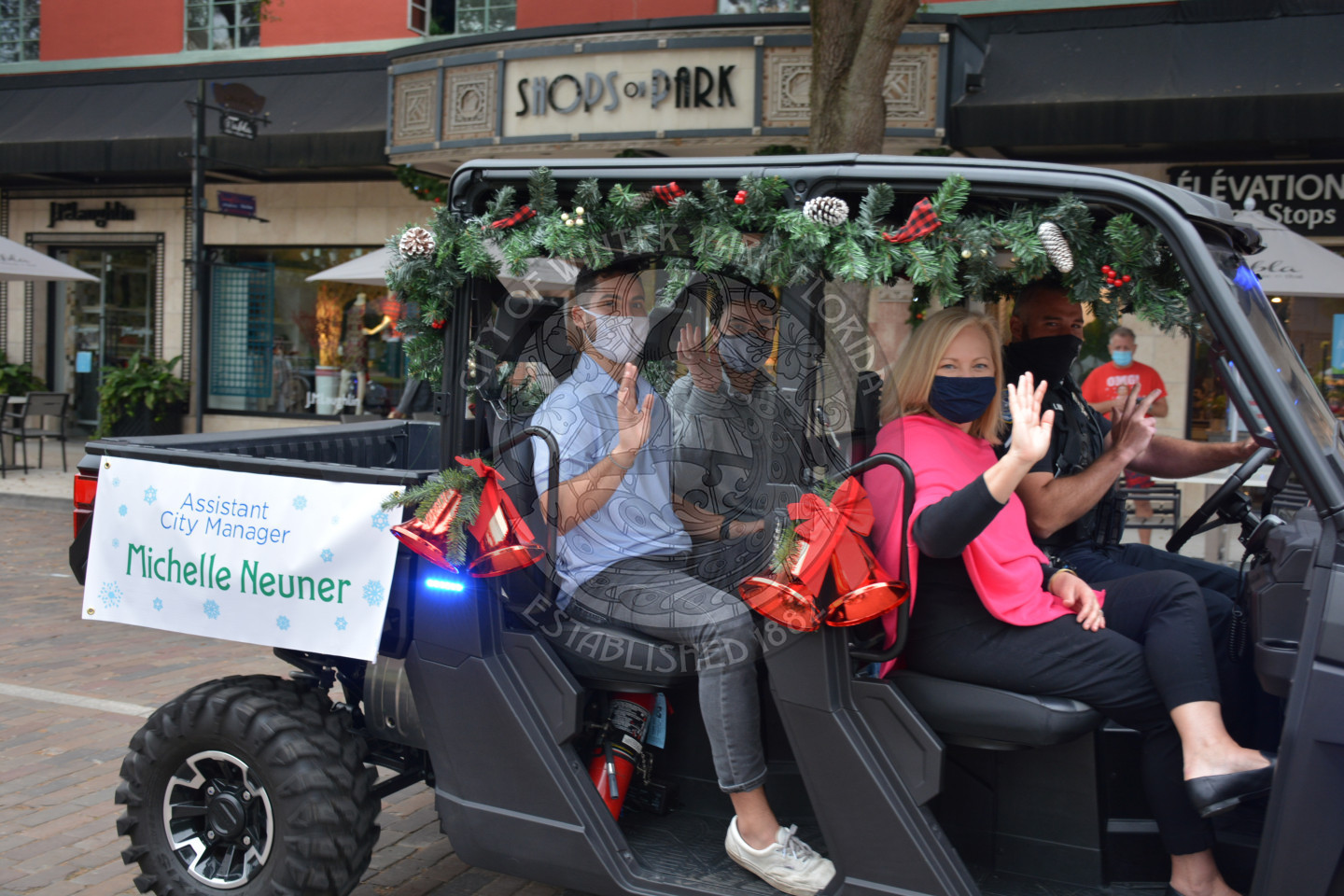 Assistant City Manager Michelle del Valle and family in the parade
