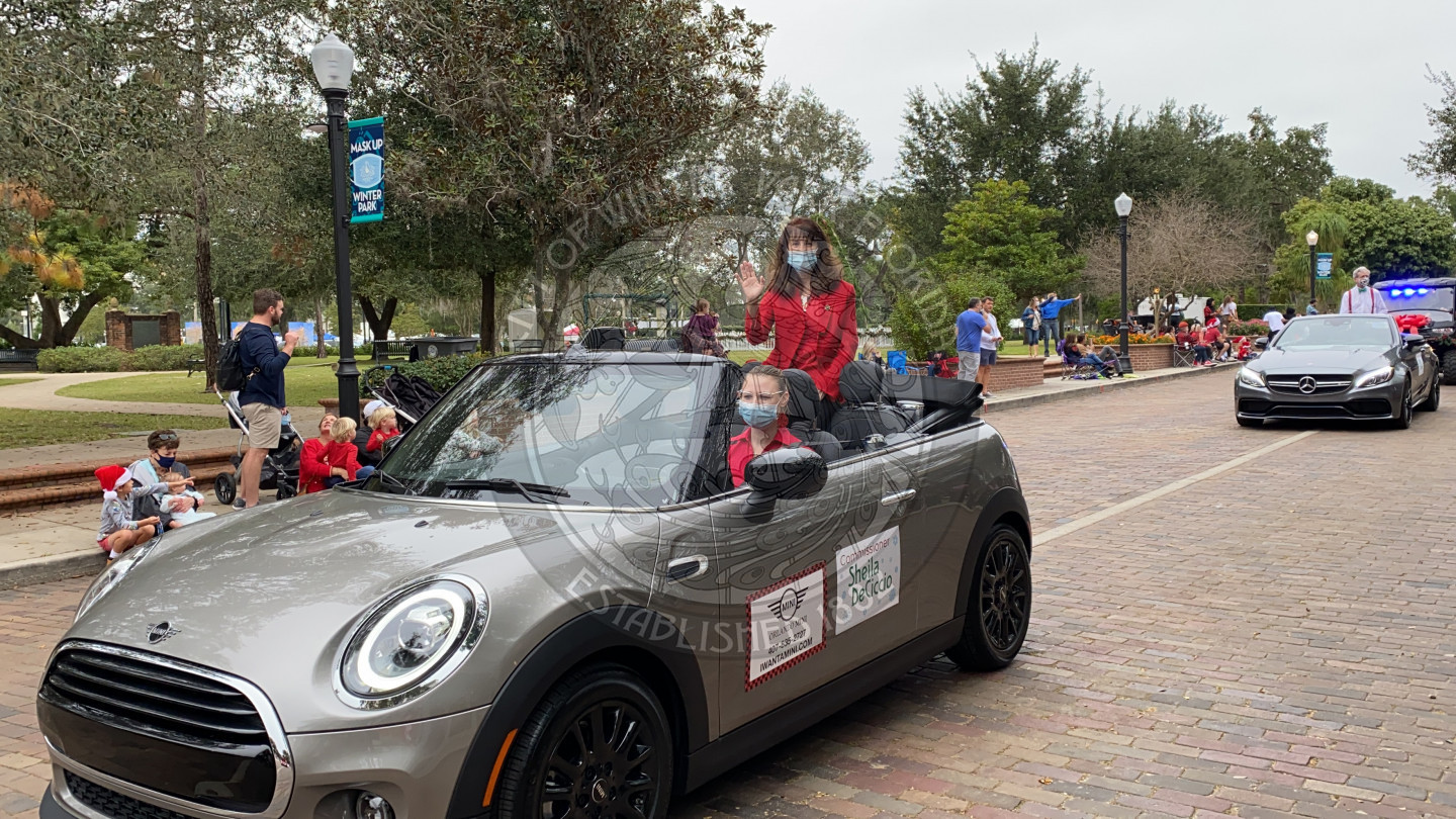 Commissioner DeCiccio waving from her parade car