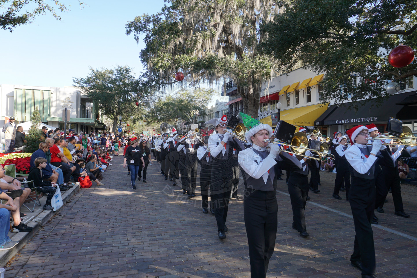 Winter Park High School Band marching down Park Avenue