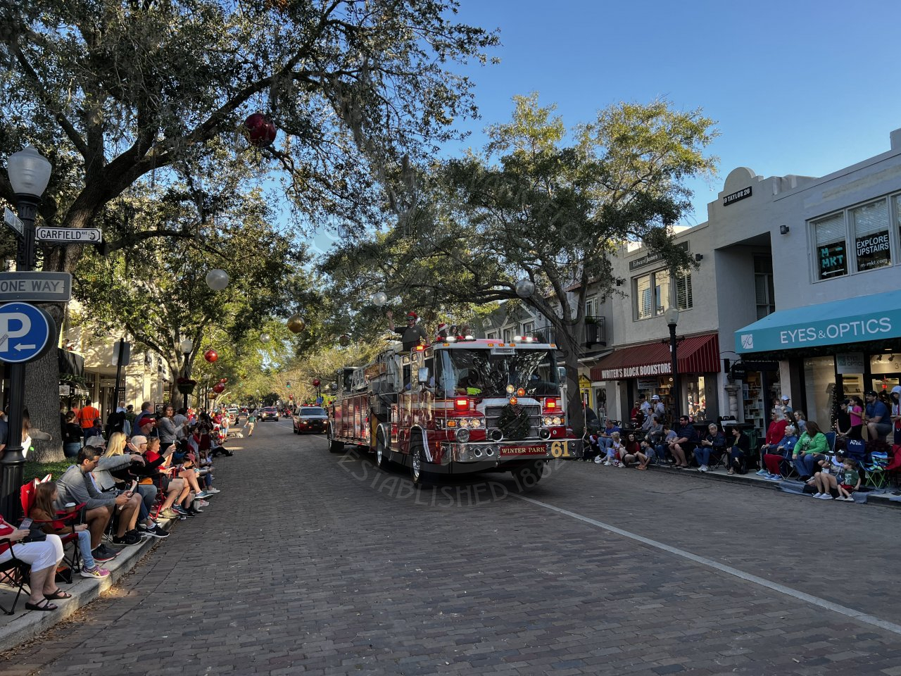 Winter Park Fire Department fire truck driving down Park Avenue.