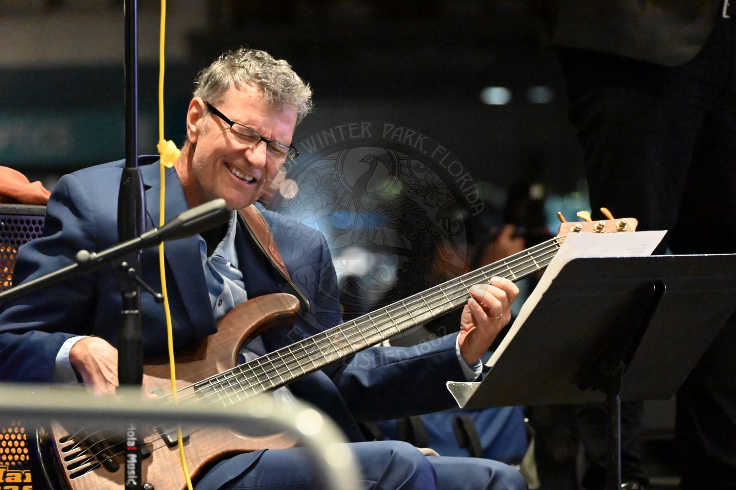 a bassist playing his instrument.