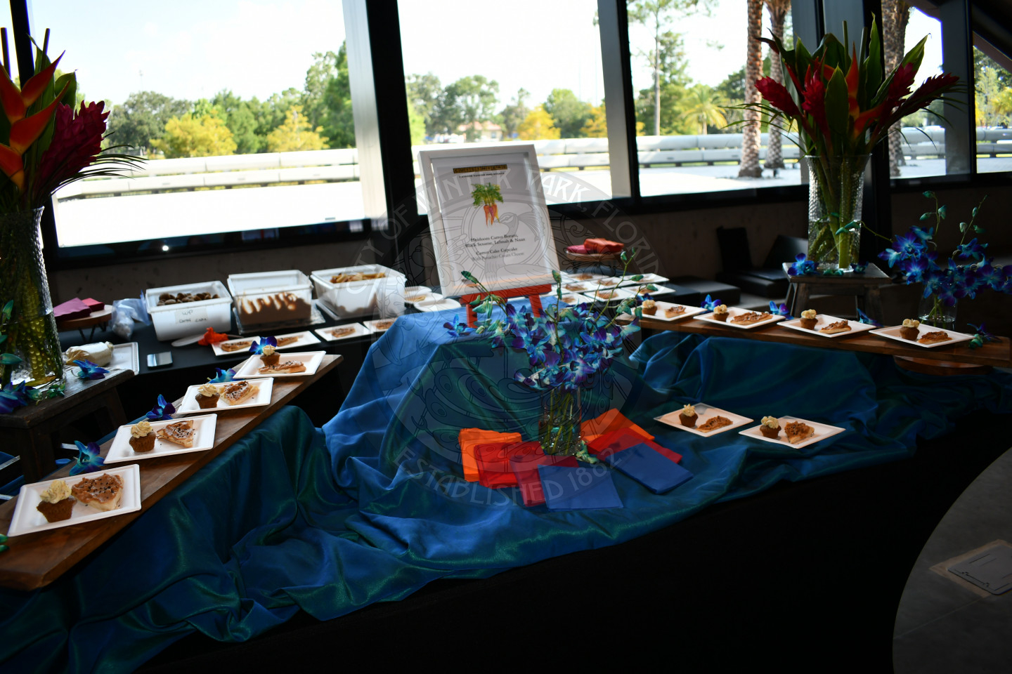 Dessert display on a table right in front of a window