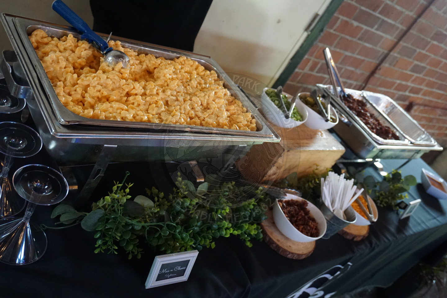 macarnoi and cheese bar with a bunch of toppings to choose from