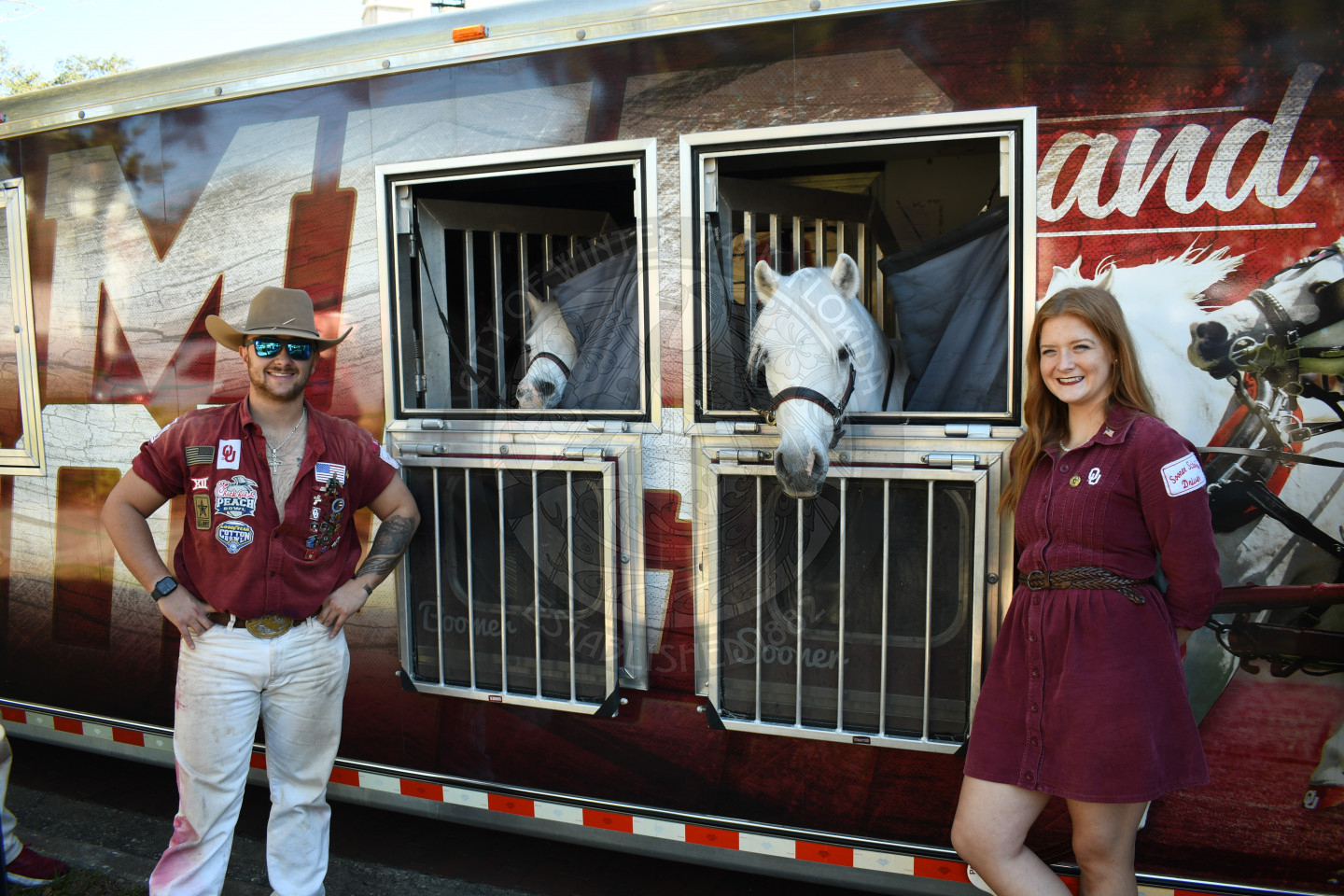 The University of Oklahoma Boomer and Sooner and their Sooner Schooner drivers