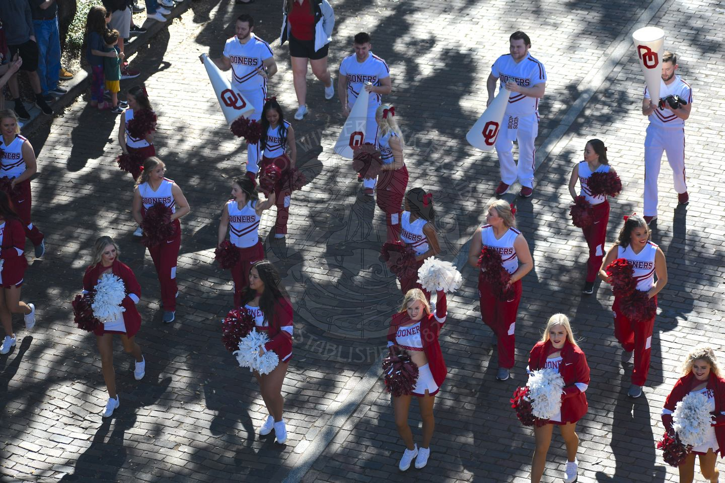 OU cheerleaders marching down Park Avenue