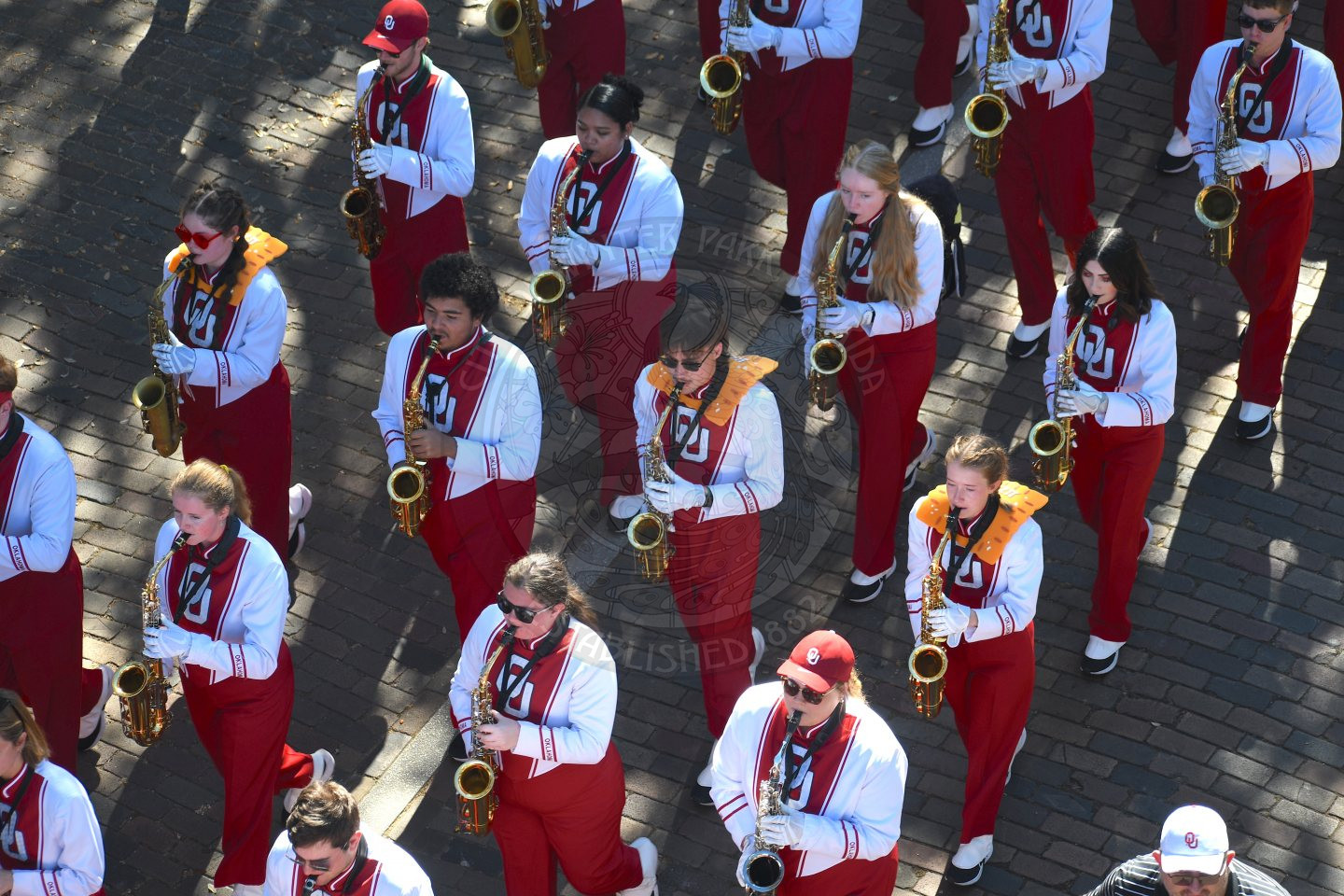 Close up of OU saxophones with Cheez-Its around their necks