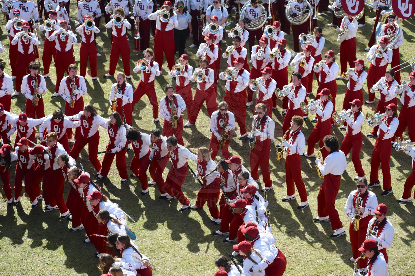 OU band peforming against FSU band