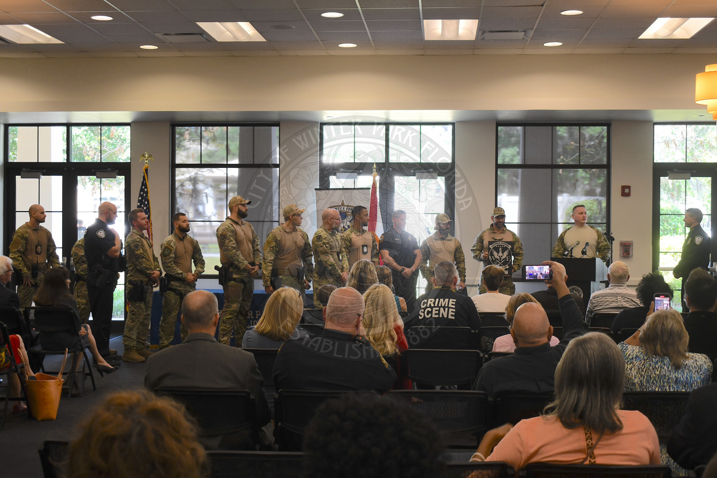 SWAT team presenting award to Chief Volkerson