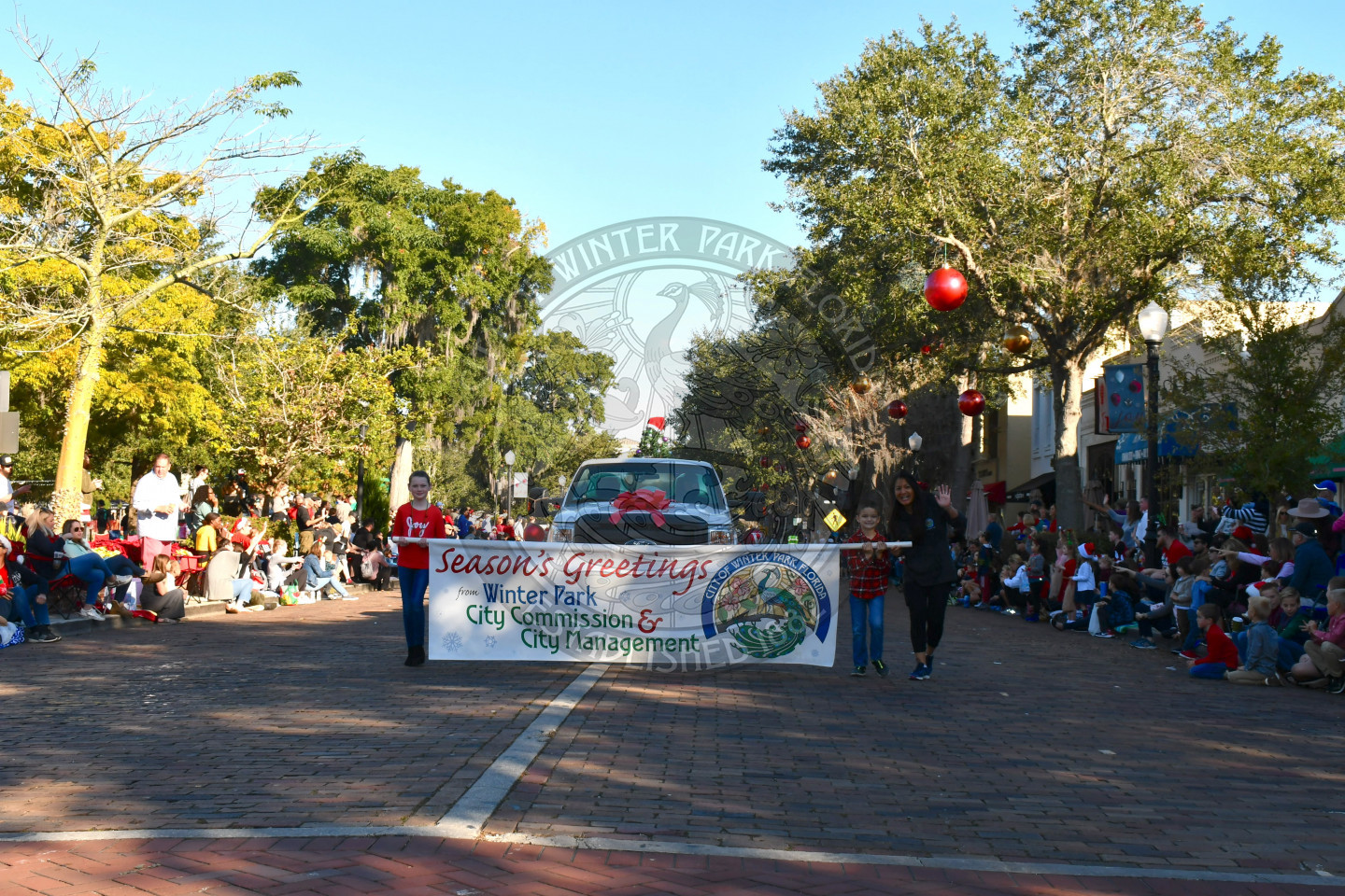 Season's greeting banner in the beginning of the parade