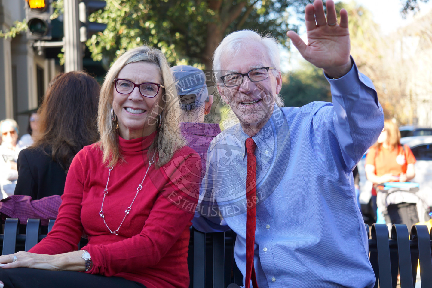 Mayor Anderson and his wife sitting on the parade float