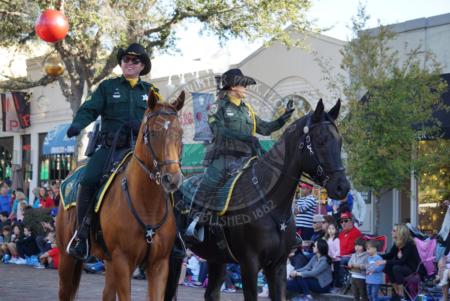 two sheriffs riding on horses