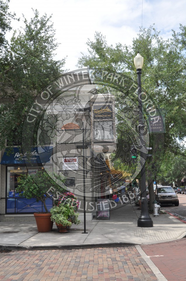 The Peterbrooke clock and street view of Park Avenue store fronts