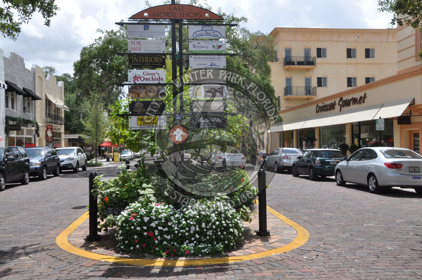 Signage of the various stores posted in the median of Morse Boulevard
