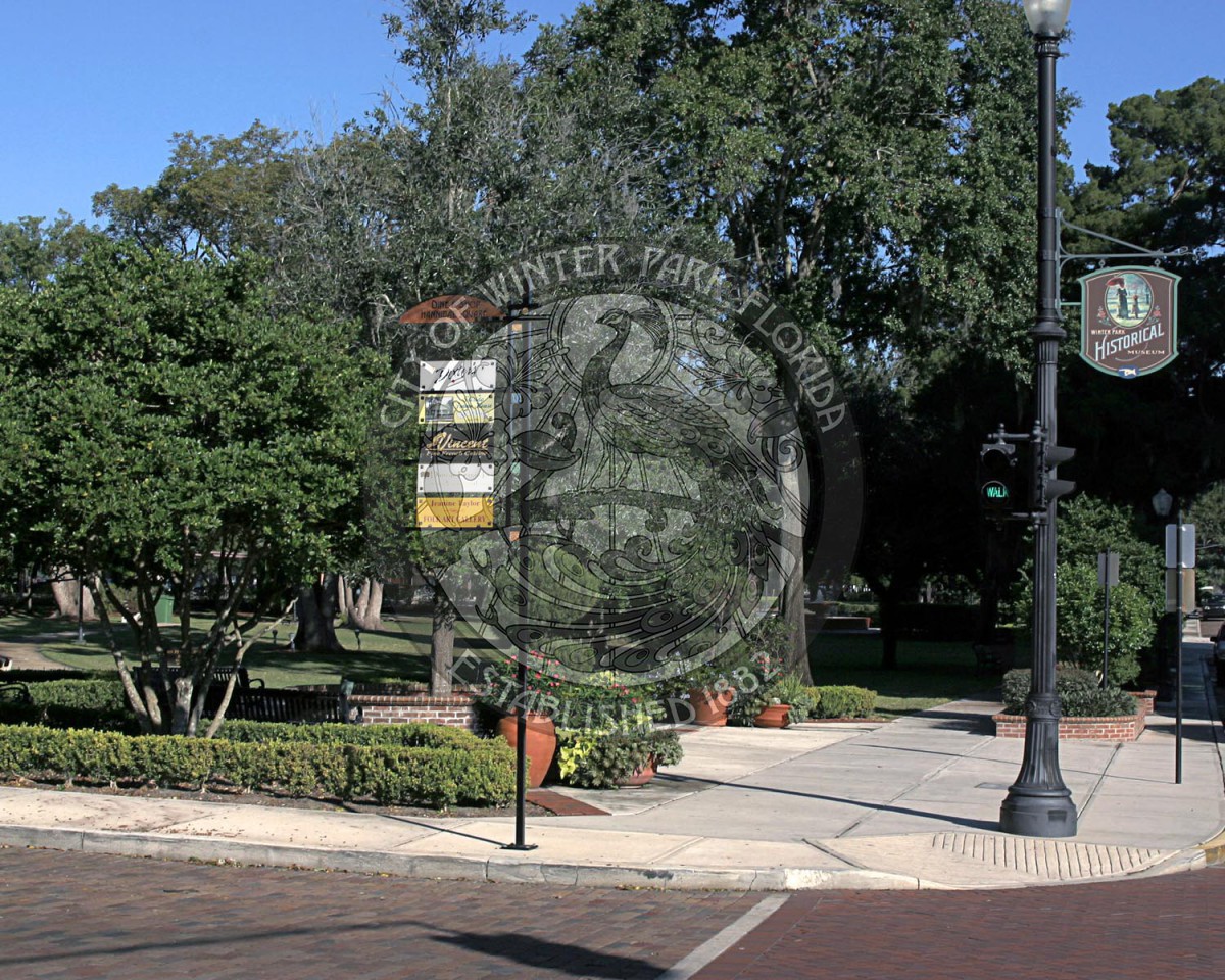 Corner of Park Avenue and New England Avenue showing the store signage