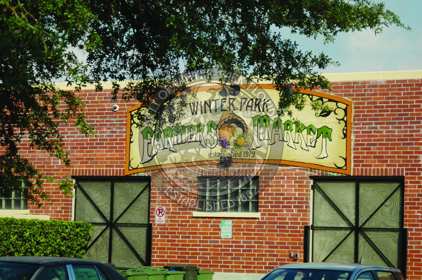 Exterior signage that displays the Winter Park Farmers Market name