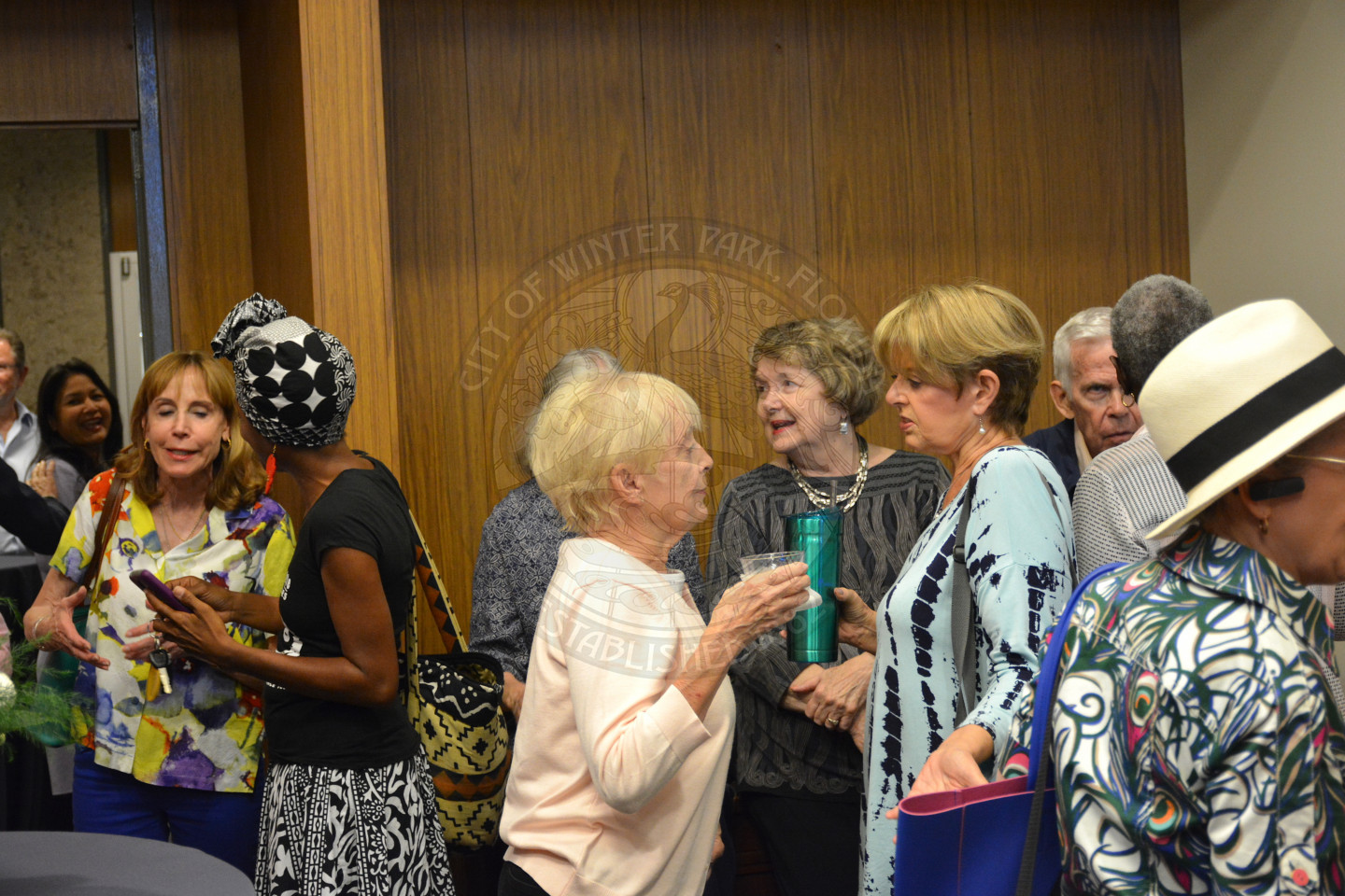 Oath of Office attendees mingling and talking with other attendees at the reception.