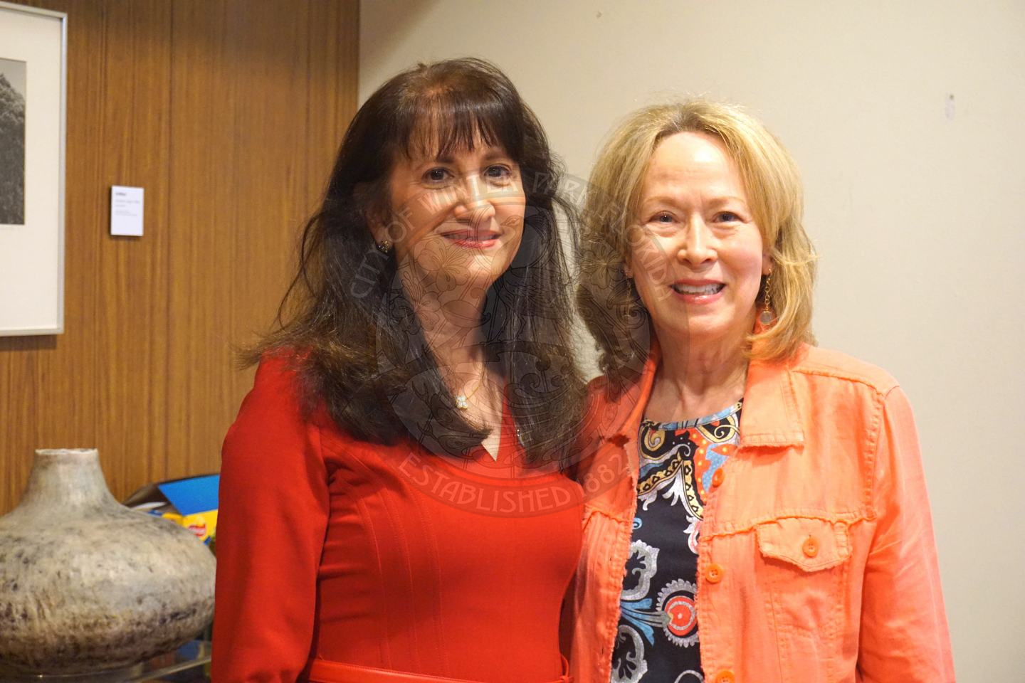 two women smiling for the camera