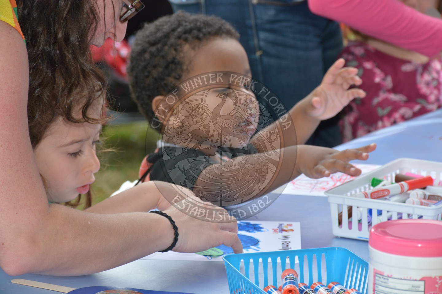 children playing with arts &amp; crafts