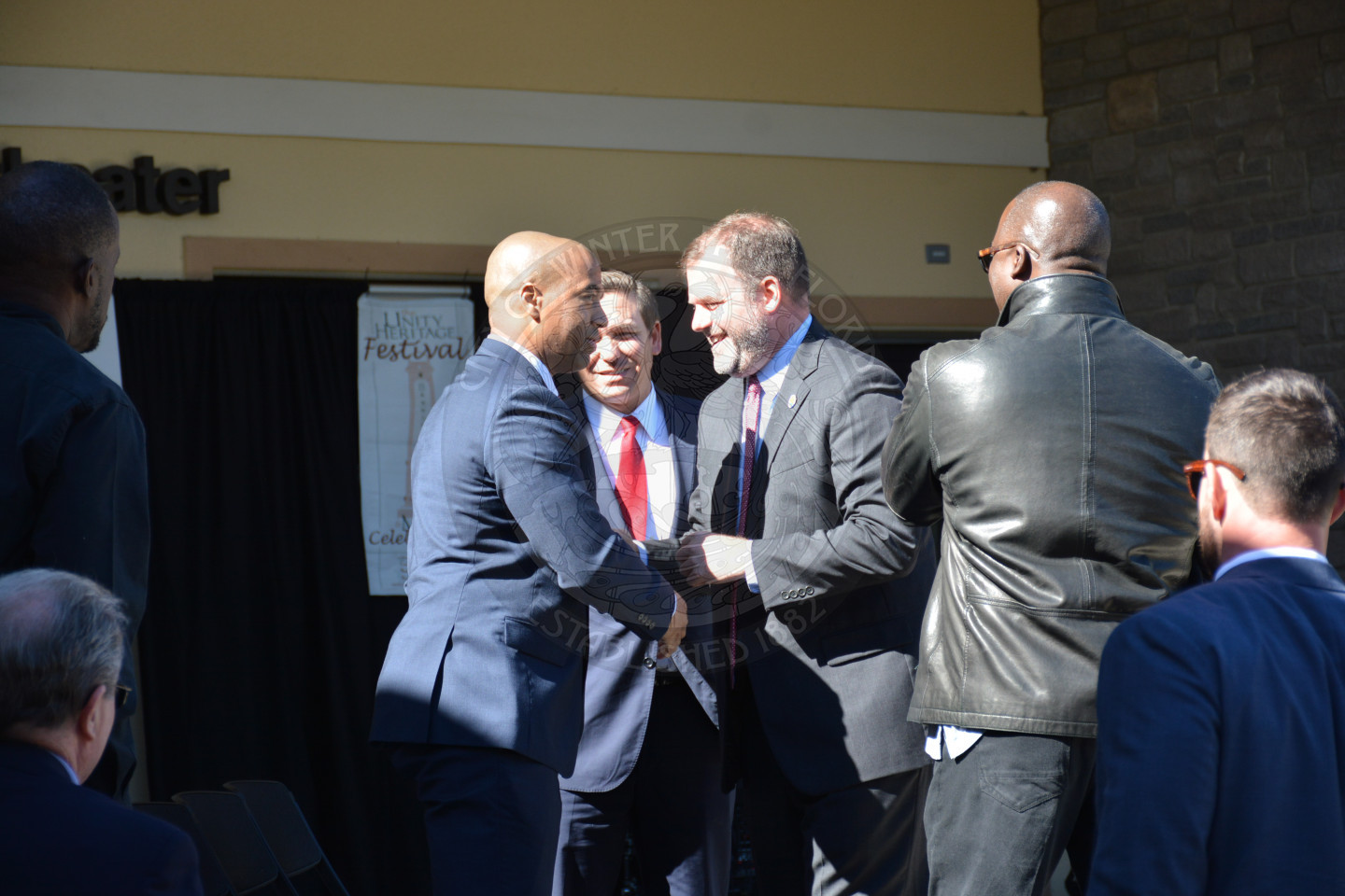 Mayor Steve Leary sharing hands with invited guests