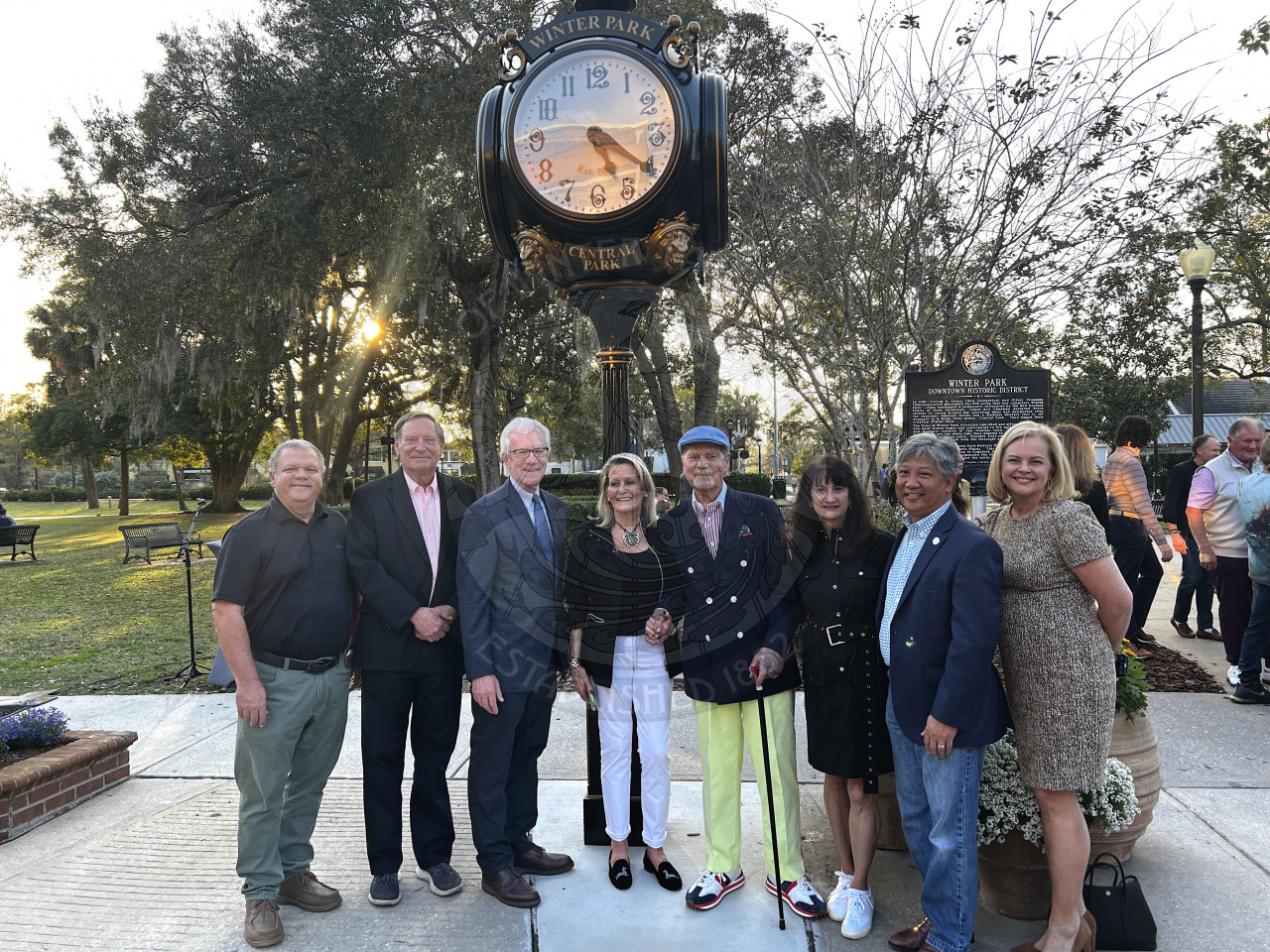 Group photo of city staff, mayor, commissioners, and Michael and Gail Winn.